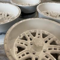 Automobile powder coated tires and wheels