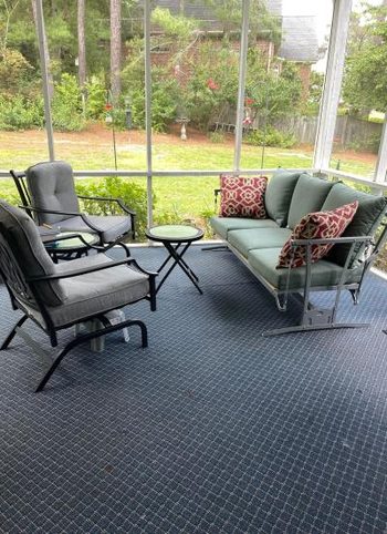 Powder coated patio furniture on a screened porch
